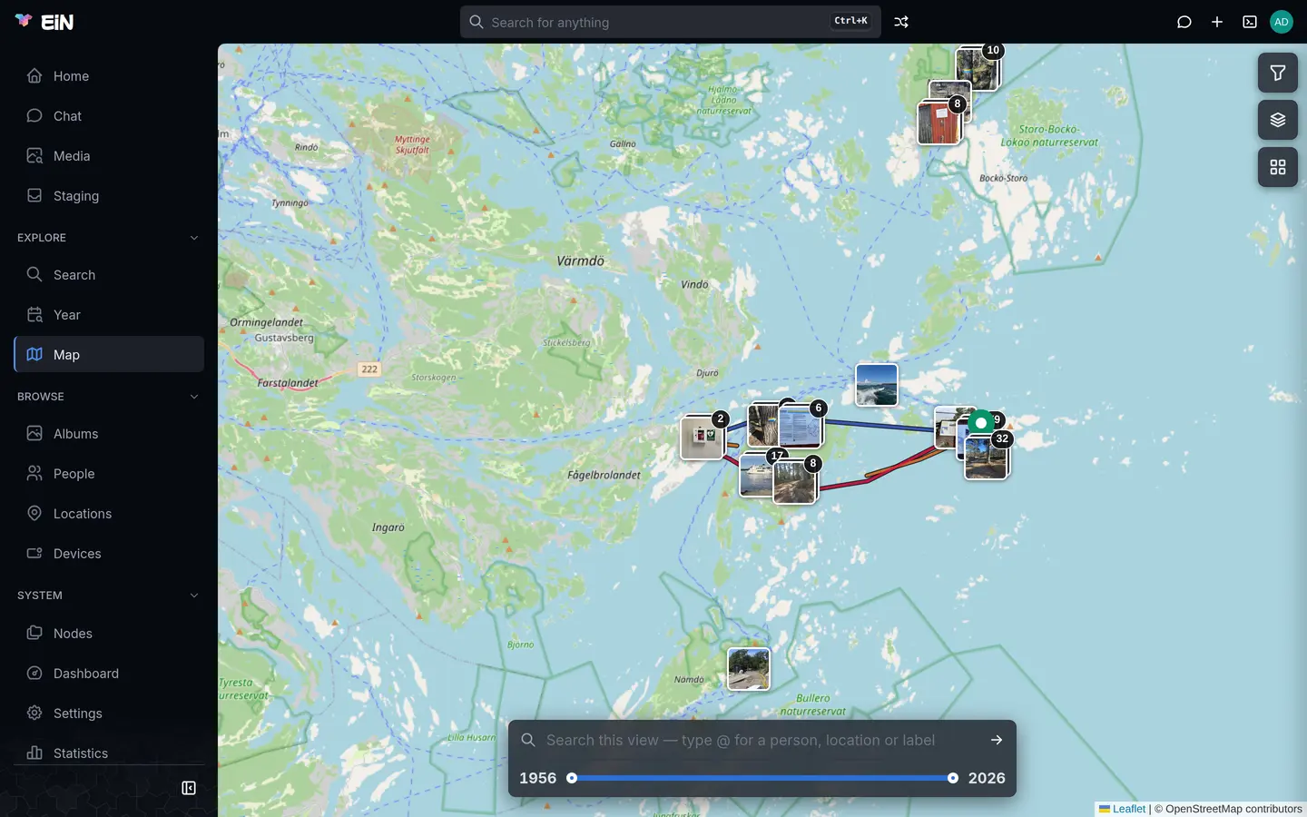 The map over the Stockholm archipelago, with GPS tracks drawn as lines and clusters of photos along them