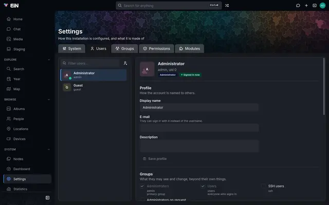 The Users tab with the administrator and the guest, and the administrator's profile and groups